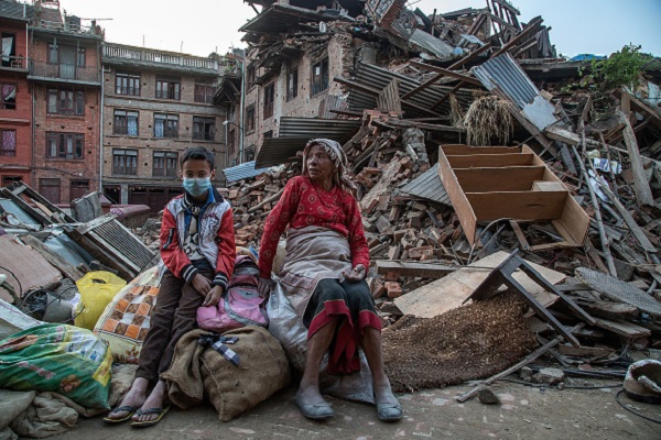 <> on April 29, 2015 in Kathmandu, Nepal. A major 7.8 earthquake hit Kathmandu mid-day on Saturday, and was followed by multiple aftershocks that triggered avalanches on Mt. Everest that buried mountain climbers in their base camps. Many houses, buildings and temples in the capital were destroyed during the earthquake, leaving over 4600 dead and many more trapped under the debris as emergency rescue workers attempt to clear debris and find survivors. Regular aftershocks have hampered recovery missions as locals, officials and aid workers attempt to recover bodies from the rubble.